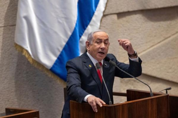 Israel's Prime Minister Benjamin Netanyahu addresses lawmakers in the Knesset, Israel's parliament, in Jerusalem. Mo<em></em>nday Nov. 18, 2024. (AP Photo/Ohad Zwigenberg)