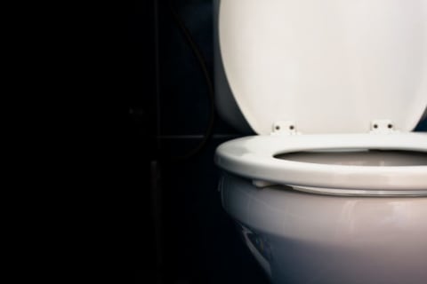 A sink full of dirty dishes.