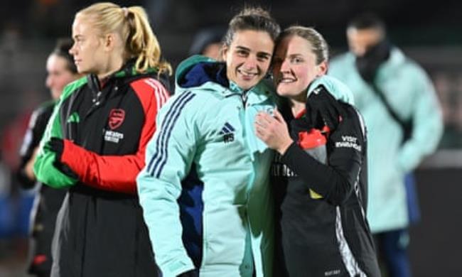 Renée Slegers and Kim Little pose and celebrate after winning the Women’s Champions League match at Juventus.