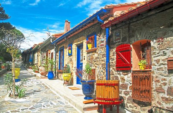 Admire the stone houses along Rue des Caranques in the historic port town of Collioure.