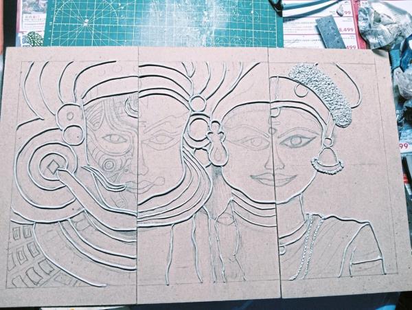 Epoxy clay is used to outline Vinothini's lippan kaam artwork. — VINOTHINI MUNUSAMY