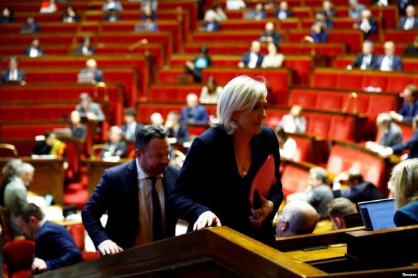 FILE - French far-right leader and member of parliament Marine Le Pen arrives for a vote on a no-co<em></em>nfidence motion against the French government, at the Natio<em></em>nal Assembly in Paris on Dec. 4, 2024.