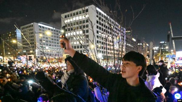People take part in a protest calling for the ouster of South Korea President Yoon Suk Yeol outside the Natio<em></em>nal Assembly in Seoul on Dec. 7, 2024.