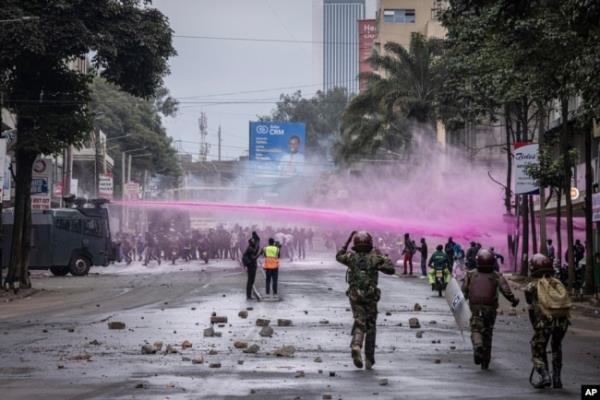 FILE - Police fire water canons during a protest in Nairobi, Kenya, July 16, 2024. Police hurled tear gas canisters to break up protests in Nairobi and other major cities accusing the president of poor governance and calling for his resignation.