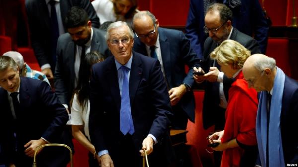 French Prime Minister Michel Barnier reacts after the result of the vote on the first motion of no-co<em></em>nfidence against the French government, at the Natio<em></em>nal Assembly in Paris, France, December 4, 2024. 
