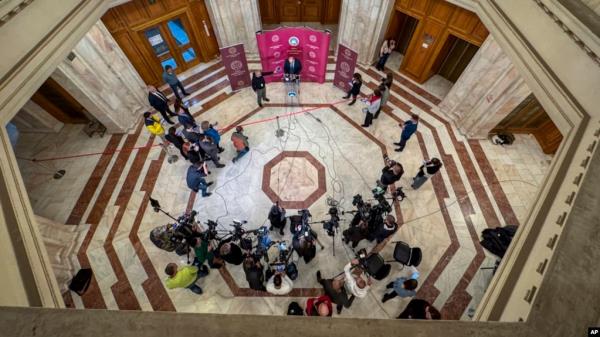 Marian Enache, the president of Romania's Co<em></em>nstitutional Court, delivers a statement to the media after the court validated the first round of presidential elections, in Bucharest, Romania, Dec. 2, 2024.