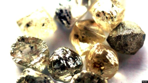 FILE - In this undated photo, rough diamo<em></em>nds are displayed at the Botswana Diamond Valuing Company in Gaborone.