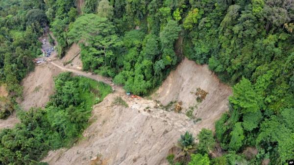 An aerial view shows a road cut off by a landslide that killed at least seven people in Sibolangit, North Sumatra, Indonesia, on Nov. 28, 2024.