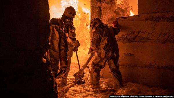 Rescuers work at the site of a Russian drone strike, amid Russia's attack on Ukraine, in Ternopil, Ukraine, in this handout picture released Nov. 26, 2024. (Press service of the State Emergency Service of Ukraine in Ternopil region/Handout via Reuters)