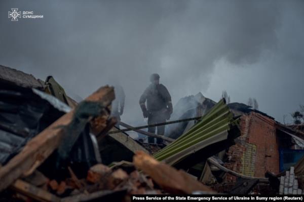 Firefighters work at the site of a Russian military strike, amid Russia's attack on Ukraine, in Sumy, Ukraine November 26, 2024. (Press service of the State Emergency Service of Ukraine in Sumy region/Handout via Reuters)