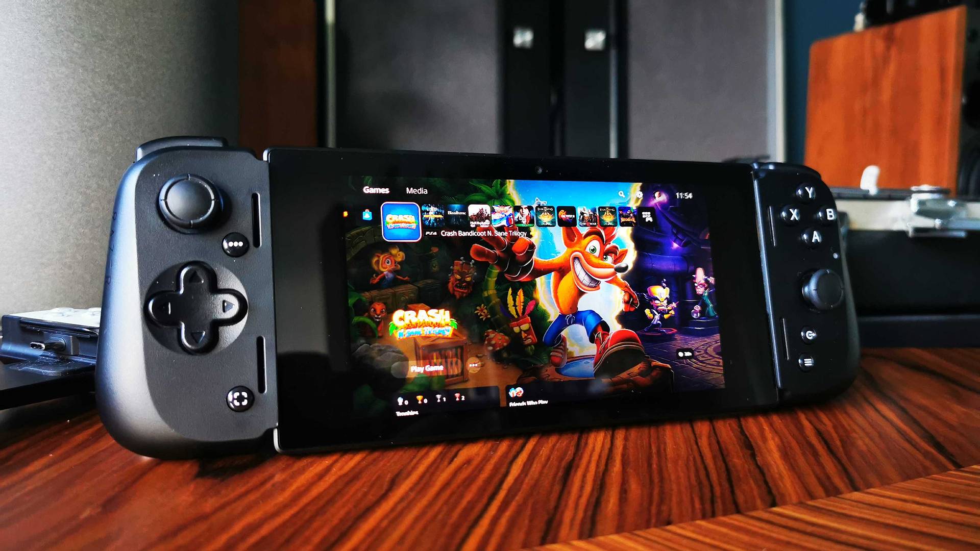 Razer Edge with PS5 main menu on screen using Remote Play