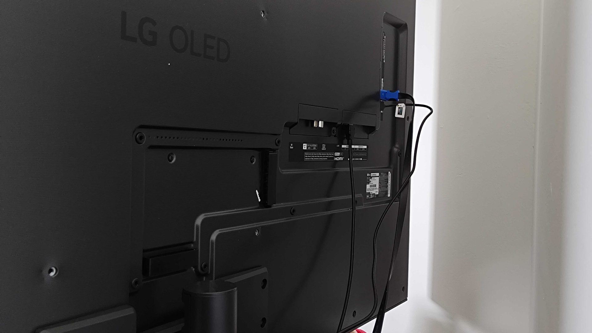 Back view of LG OLED G4 with cables connected