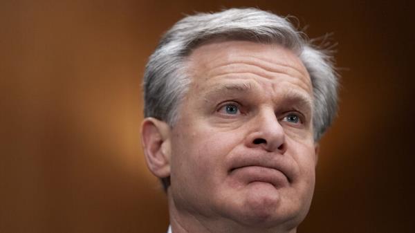 FBI director says he intends to resign at end of Joe Biden’s term in January