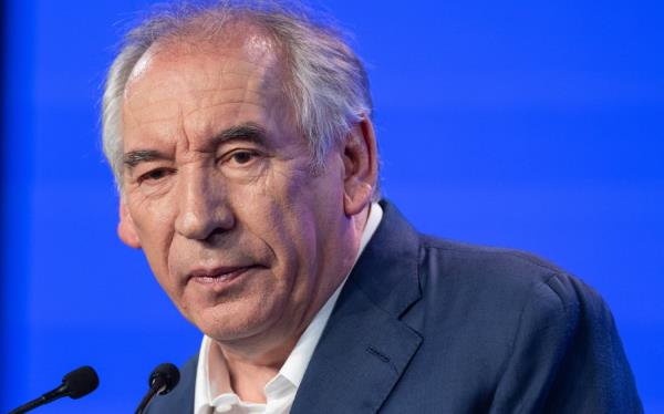 (FILES) France's centrist Democratic Movement (MoDem) party leader Francois Bayrou delivers a speech during the MoDem summer university in Guidel, western France, on September 29, 2024. - France is headed into a new political crisis on December 3, 2024, as opposition lawmakers vowed to topple the minority government of Prime Minister Michel Barnier in a no-co<em></em>nfidence vote after just three mo<em></em>nths in office. If the government falls, it would be the first successful no-co<em></em>nfidence vote since a defeat for Georges Pompidou's government in 1962, when Charles de Gaulle was president. If the vote passes, French President Emmanuel Macron will have to name a new Prime Minister. Speculations on future successors have floated the names of French Minister of Defence Sebastien Lecornu, or the centrist politician and former presidential candidate Francois Bayrou. (Photo by FRED TANNEAU / AFP)