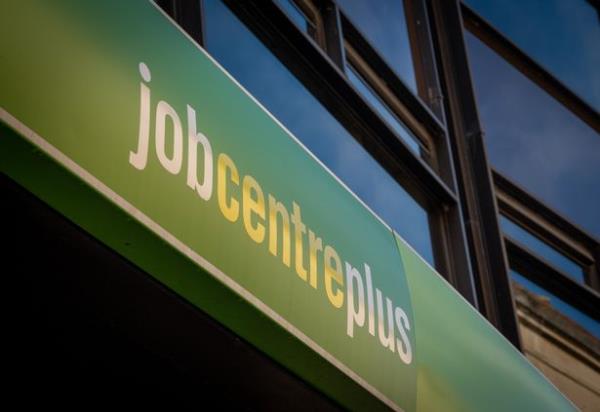 Jobcentre Plus logo on building sign