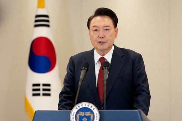 韩国调查人员以戒严令为由申请逮捕令