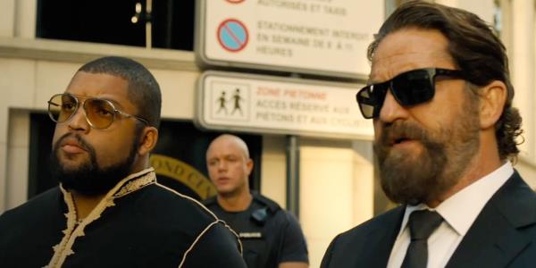 Nick (Gerard Butler) and Do<em></em>nnie (O'Shea Jackson Jr.) standing next to each in Den of Thieves 2