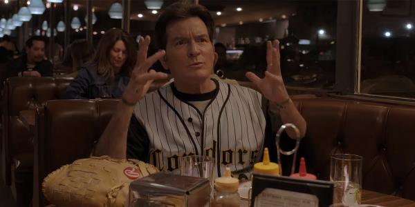 Charlie Sheen making an explosion motion in Bookie season 2