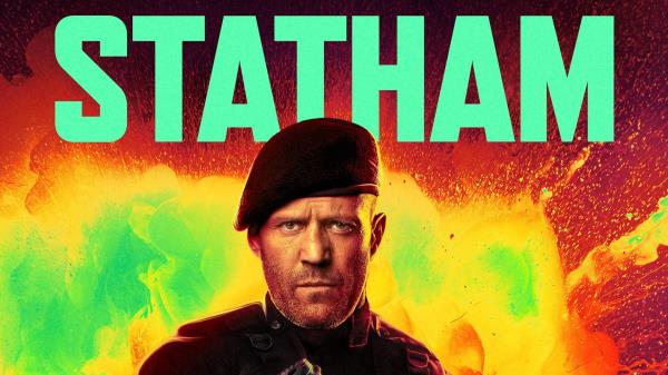 Jason Statham in a beret in Expend4bles with his last name in green