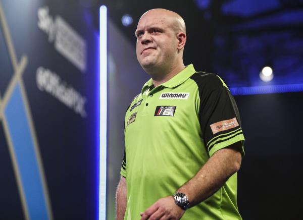 Michael Van Gerwen walks off stage after losing the opening set to Chas Barstow during day four of the William Hill World Darts Champio<em></em>nship at Alexandra Palace, London. Picture date: Saturday December 18, 2021.