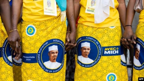 Supporters wearing loincloths bearing the effigy of Chadian President Mahamat Idriss Deby Itno gather at a Patriotic Salvation Movement (MPS) campaign meeting in the Sabangali district of N'Djamena, on Dec. 14, 2024.