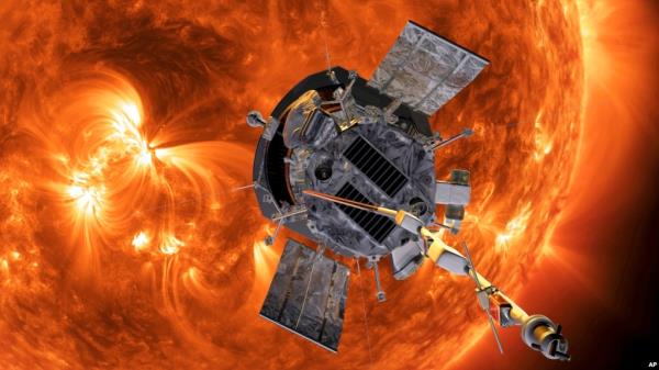FILE - This image made available by NASA shows an artist's rendering of the Parker Solar Probe approaching the Sun. The probe made history on Tuesday, flying closer to the sun than any other spacecraft. (Johns Hopkins APL/NASA)