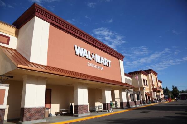 California Walmart storefront on a sunny spring afternoon. Walmart is an American public multinatio<em></em>nal corporation that runs chains of large discount department stores and warehouse stores.