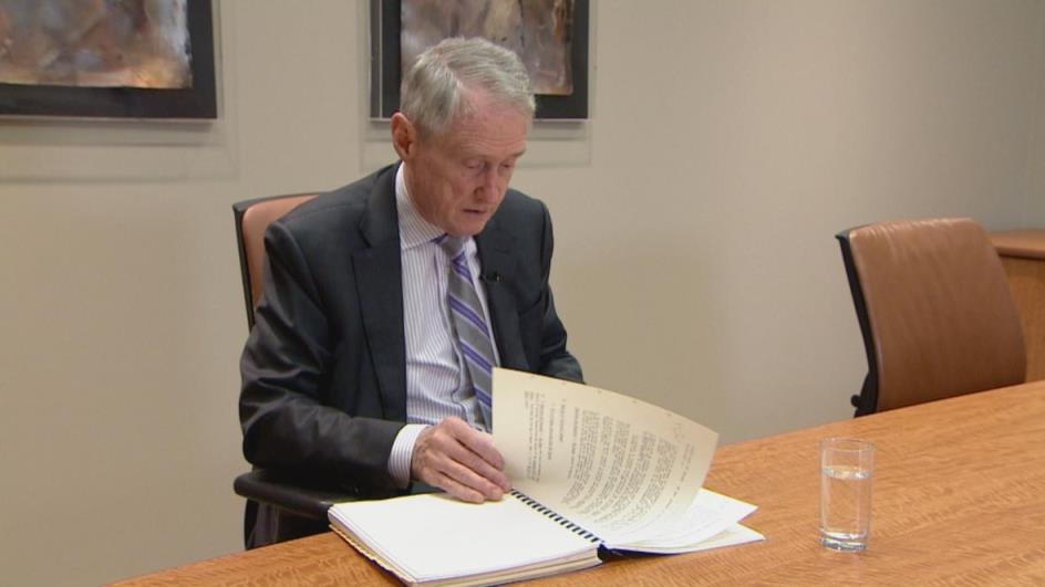 A man reads a legal brief.