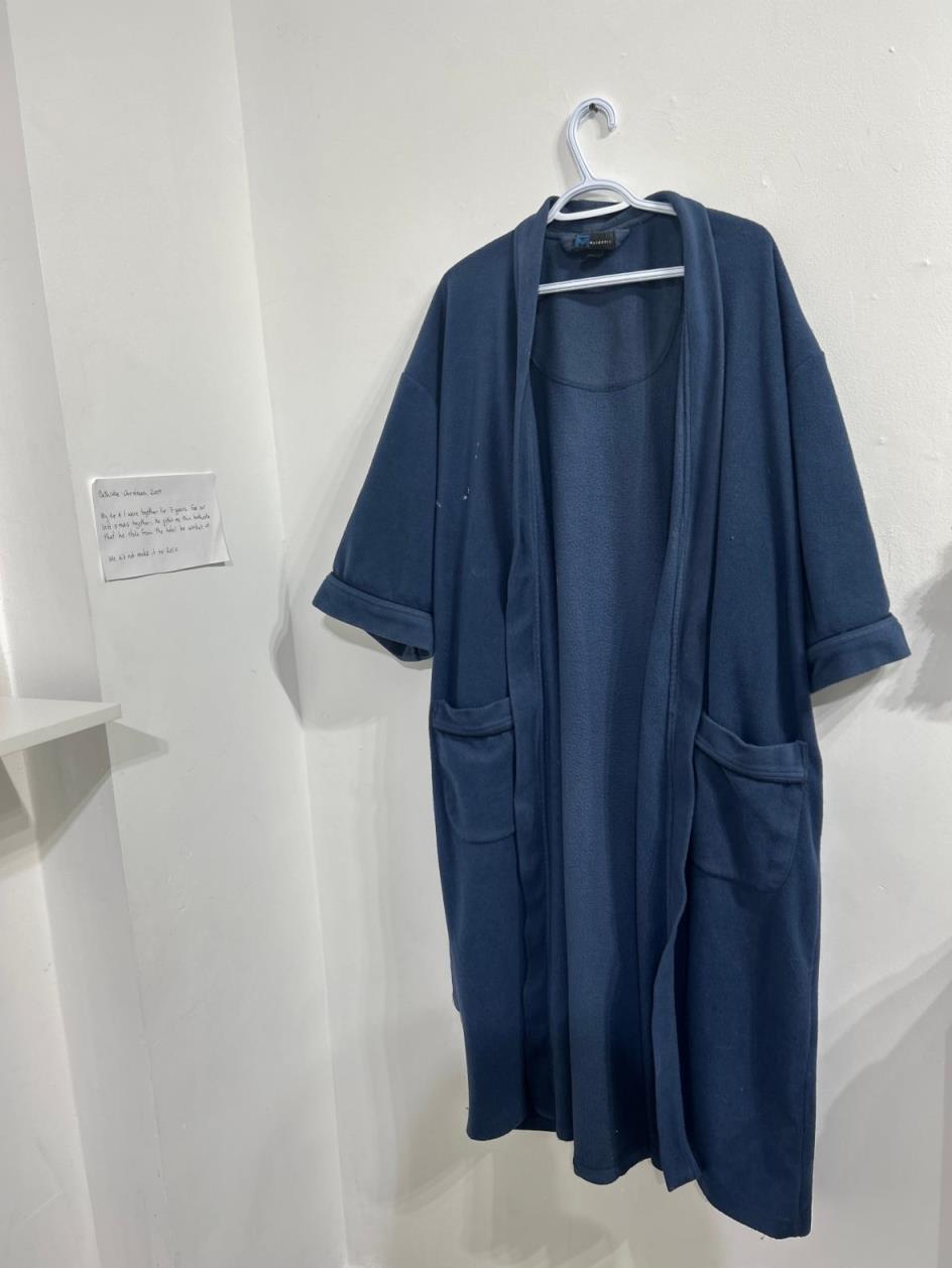 This used robe was given as a gift to a woman by her ex, who stole it from the hotel wher<em></em>e he worked. It's now on display at the Museum of Bad Gifts.
