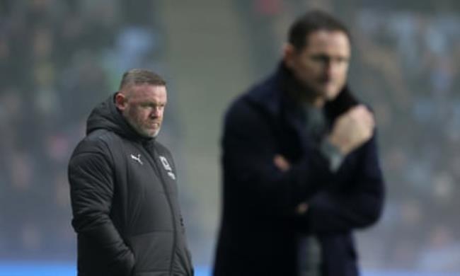 Wayne Roo<em></em>ney and Frank Lampard watch from the sidelines as Plymouth play Coventry