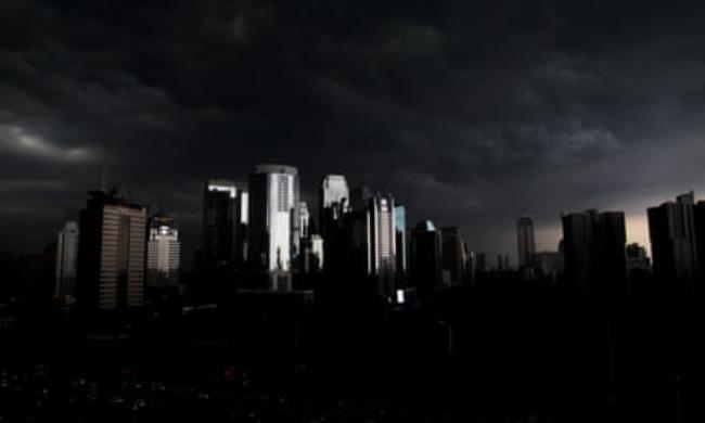 Skyscrapers in a city skyline at night