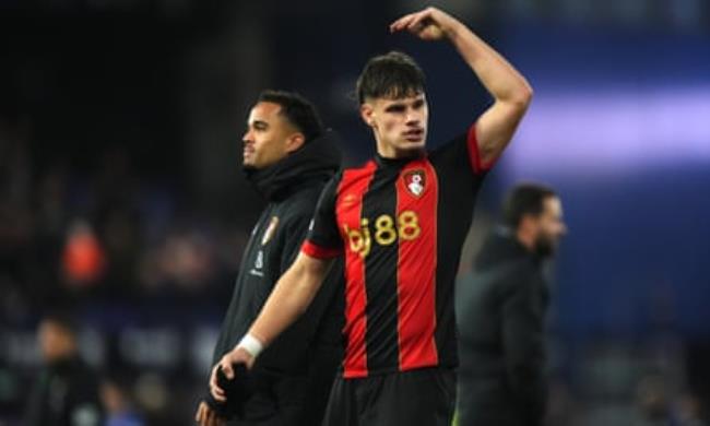 Milos Kerkez sticks his hand in the air
