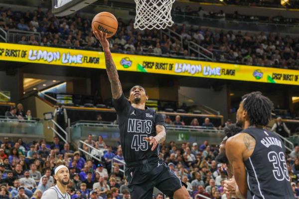 Nets guard Keon Johnson (45) goes to the basket during the second quarter against the Orlando Magic.