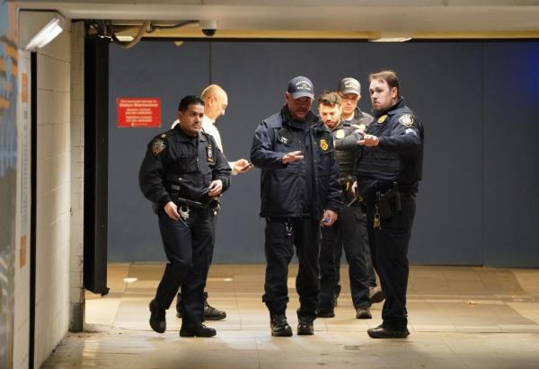 Authorities and police officers at Penn Station crime scene wher<em></em>e a person was reportedly set on fire near the NYC subway entrance.