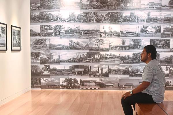 Ariff Awaluddin's 'Unalike Alike' is a photography and sculpture installation that explores the strength of multiracial bo<em></em>nds in Malaysia. Photo: Ong Soon Hin/The Star