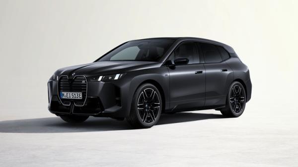 Four co<em></em>nventionally hinged doors on the new BMW iX
