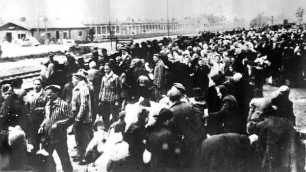 A train-load of victims destined  for Auschwitz co<em></em>ncentration camp, lined up on the railway station on arrival at Auschwitz.  A picture taken by the Nazis in the early days of WWII. (AP PHOTO/FILE)