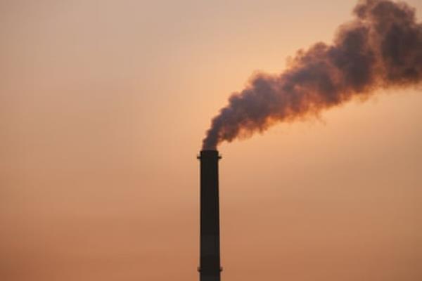 Emissions from a Queensland smoke stack at sunset