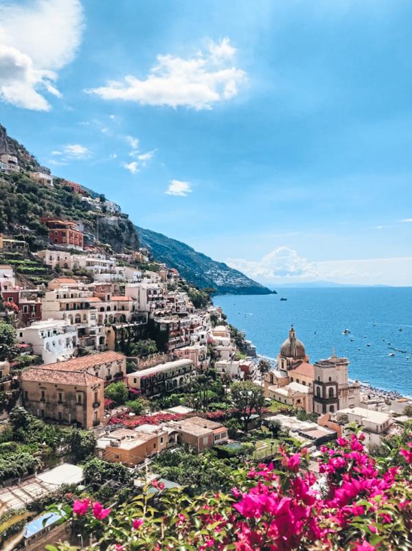 The colourful cliffside buildings of Positano overlooking the Amalfi Coast. — Unsplash